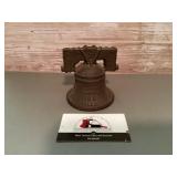 Cast-iron Liberty Bell coin bank