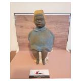 Vintage cast iron mammy on the chamber dilly