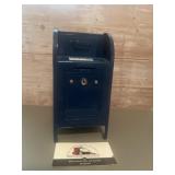 Vintage  blue metal coin bank designed to look