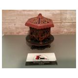 Cast-iron carousel coin bank