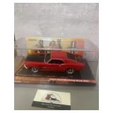 Diecast  display features a 1969 Ford Mustang B