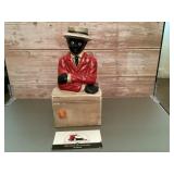 Vintage cast-iron bellhop coin bank