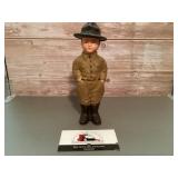 Cast-iron Boy Scout coin bank