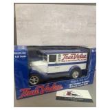 1:25 scale die-cast metal coin bank produced by