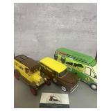 Vintage-style die-cast toy trucks featuring
