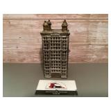 Vintage cast iron coin bank