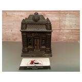 Vintage cast-iron coin bank
