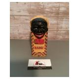 Vintage cast iron coin bank