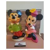 Mickey mouse stature and plastic Minnie mouse