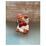 Vintage ceramic sitting clown piggy bank