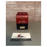 Cast iron miniature mailbox coin bank styled