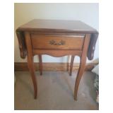 Drop leaf stand