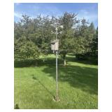 Handmade plant hanger with weather vane topper
