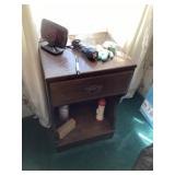 Nightstand with clock and flashlight