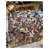 Very loved and worn comforter appears to be hand