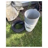 Buckets with holes for tomato plants and plastic