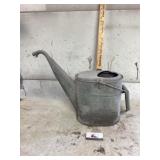 Galvanized water can
