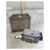 Whiting milk, crate, wood, and metal