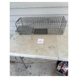 Smaller live animal trap approximately 2 foot long