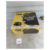 Large cast-iron kickoff grill unopened box until