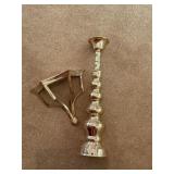 Brass wall shelf and candle stick