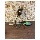 Fly Swatters and Desk Lamp