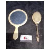 Brush and mirror