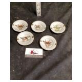 Set a porcelain two slot ashtrays