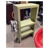 Shelf with Black & Decker vacuum approximately 2