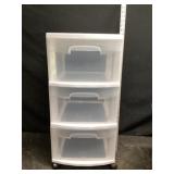 Three drawer container on wheels