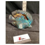 Fish paperweight with broken fin