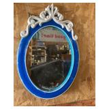 Plastic framed mirror 23 inches tall