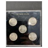 5 Morgan $1