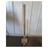 Vintage cast iron mallet with wooden handle