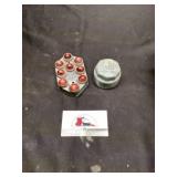 Reflecter and axel cap