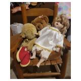 Wooden rocking chair with dolls