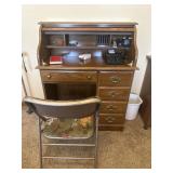 Roll top desk with supplies