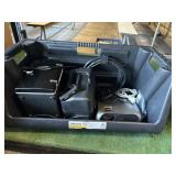 Projector, portable stove, fridge in bin