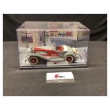 The Danbury mint Deusenberg die cast car