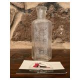 J W McMechan boone Ia Bottle
