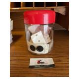 Glass jar of buttons