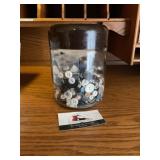Glass jar of buttons