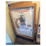 Wooden display with movie advertisement
