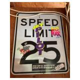 Speed limit sign with stickers