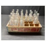 Wooden pepsi crate of Pepsi bottles