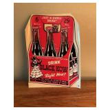 Vintage black kow soda advertiser