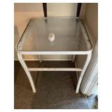 Small glass top outdoor table approximately 30' x