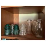 Milk bottles and glass insulators