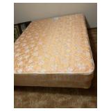 Queen bed, no headboard or footboard located in