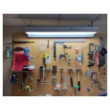 Saws, hammers, tape measures, tools, wall
